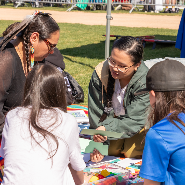 MCIC leads a workshop outside at The Forks.